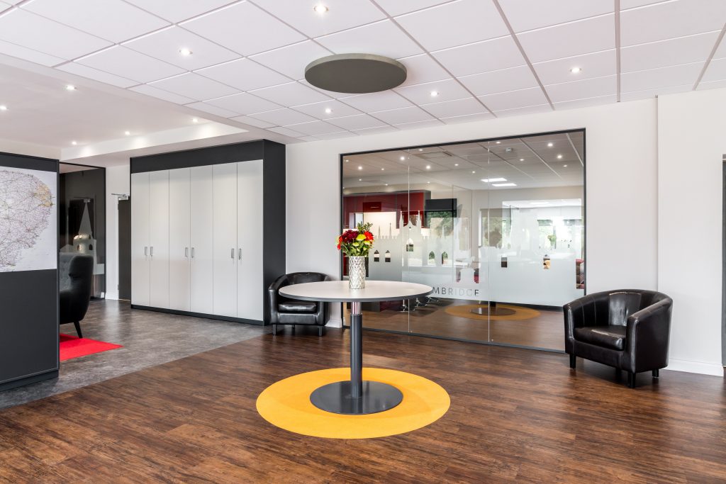 APS Showroom Storage Wall & Height Adjustable Breakout Table