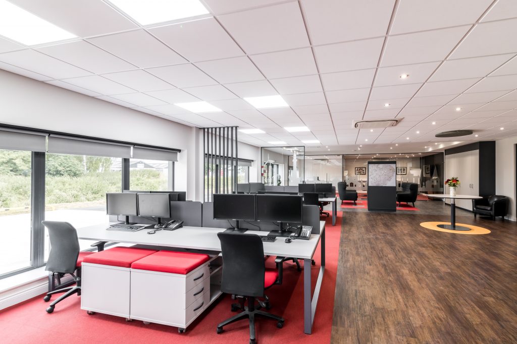 Open plan office space planning with feature flooring design.